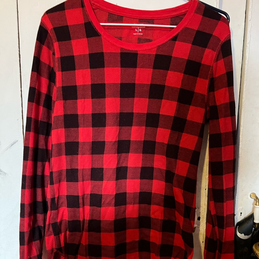 Long sleeved black and red plaid shirt